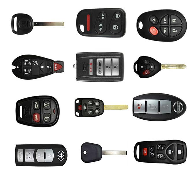 An assortment of automotive car fobs, remotes and remote head keys.